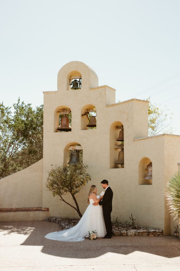 A couple exchanging private vows at Chapel Dulcinea in Austin Texas. 