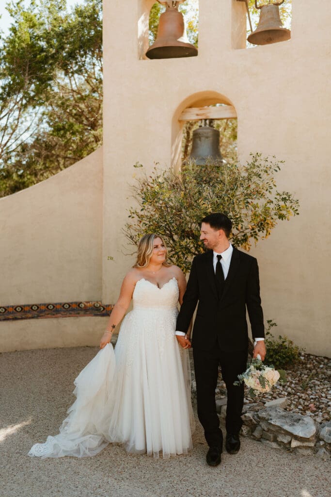 A couple having an intimate wedding ceremony at Chapel Dulcinea in Austin, Texas, enjoying bridal portraits.