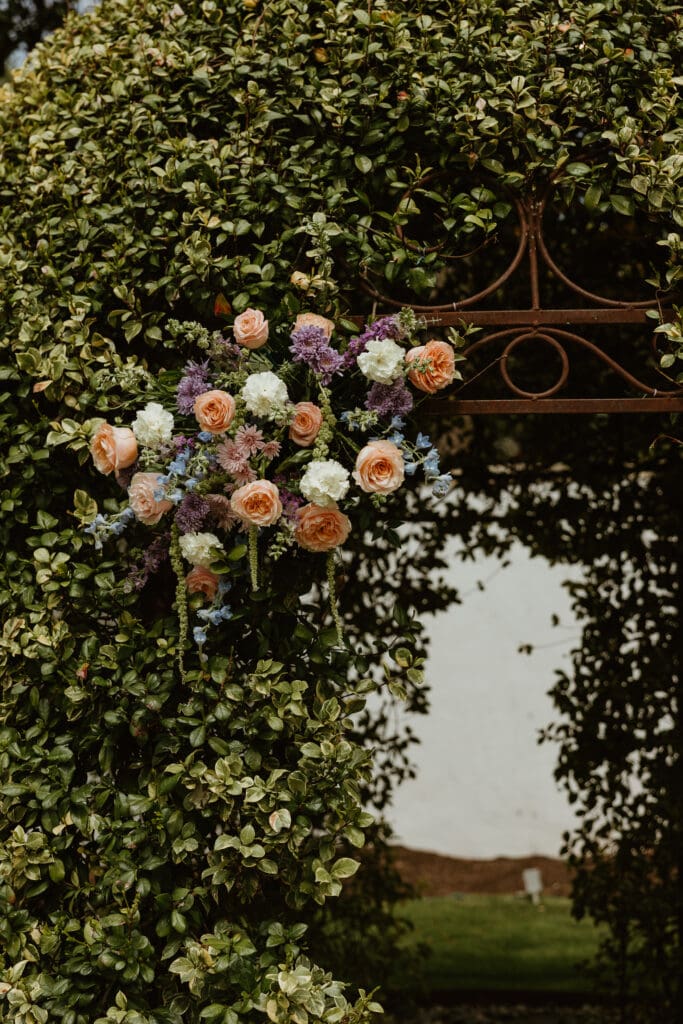 Beautiful floral arrangement at the ceremony space at The Hummingbird House Austin wedding venue