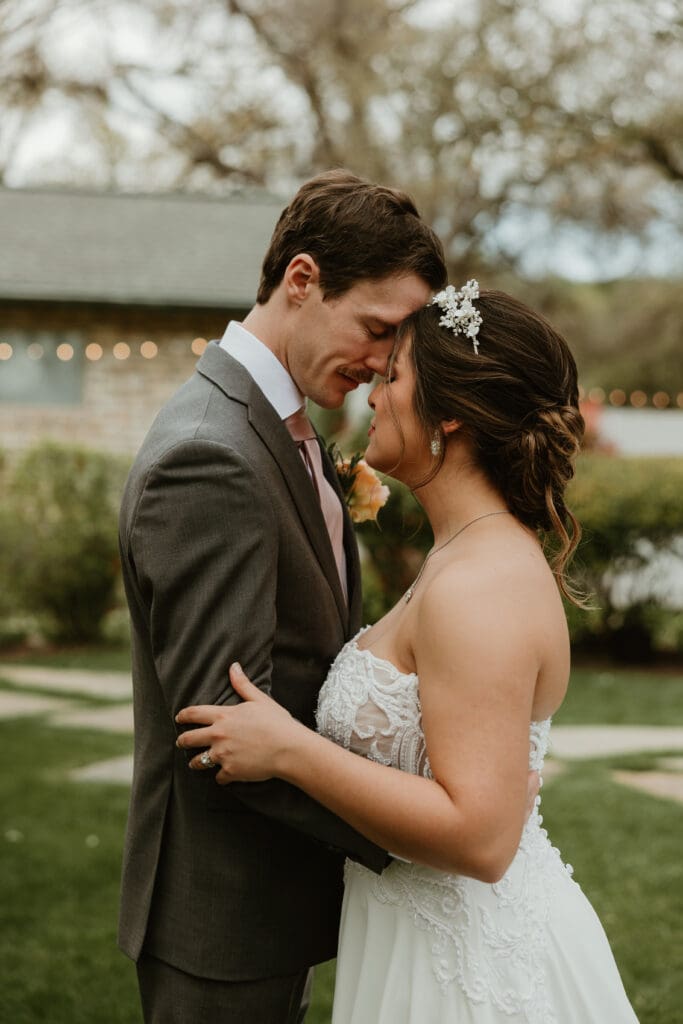 Outdoor wedding portraits in the gardens at The Hummingbird House venue near Austin