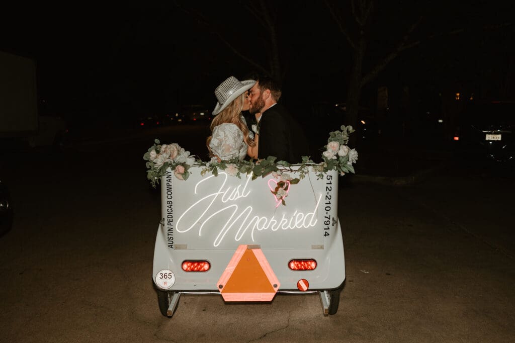 Bride and groom end of night send off with Austin Pedicab company