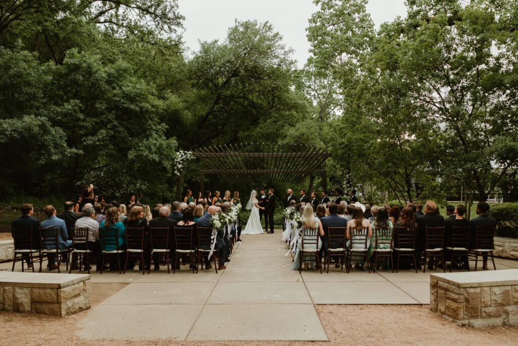 Spring wedding ceremony at Umlauf Sculpture Garden in Austin