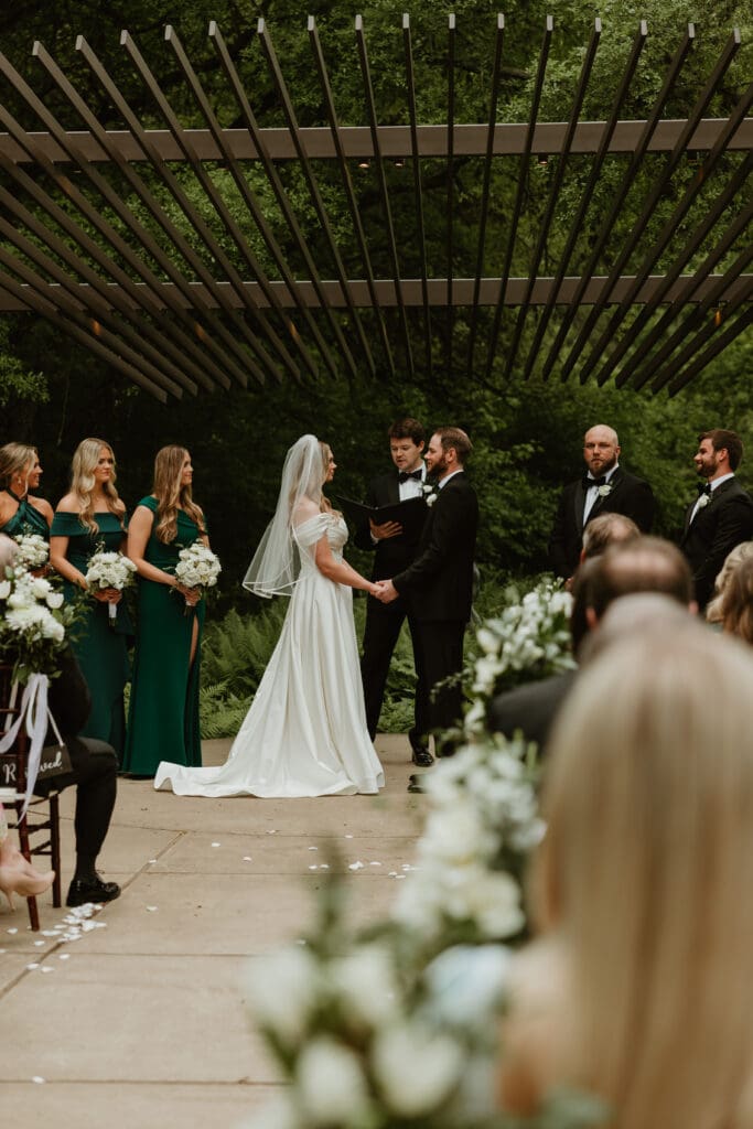 Spring wedding ceremony at Umlauf Sculpture Garden in Austin