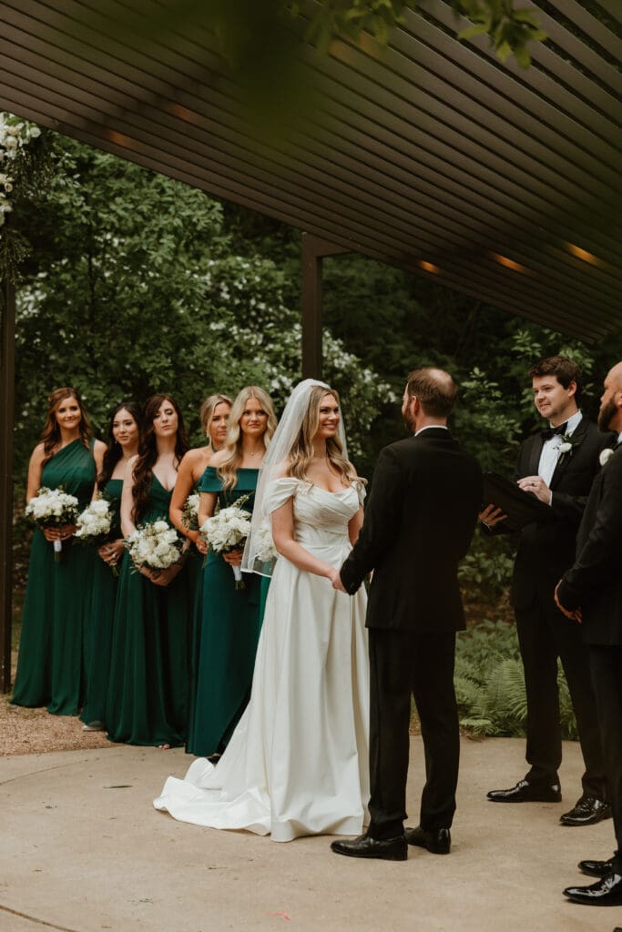 Lush spring wedding ceremony at The Umlauf Sculpture Garden in Austin