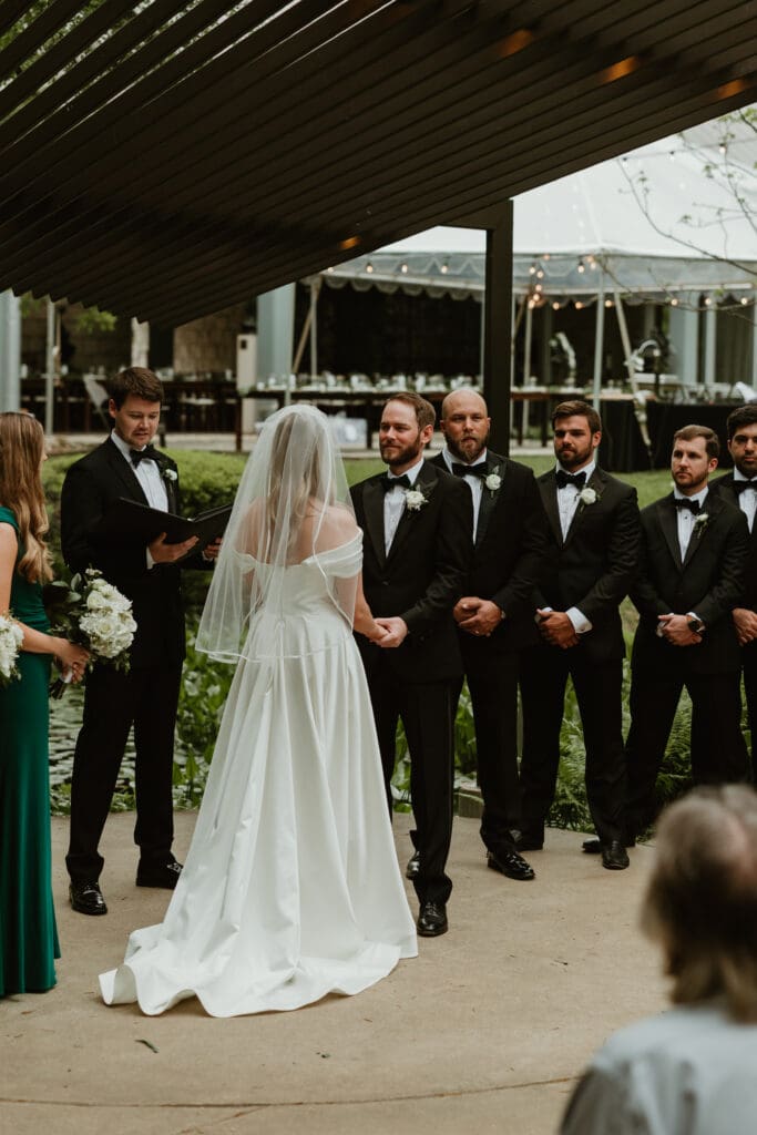 Lush spring wedding ceremony at The Umlauf Sculpture Garden in Austin