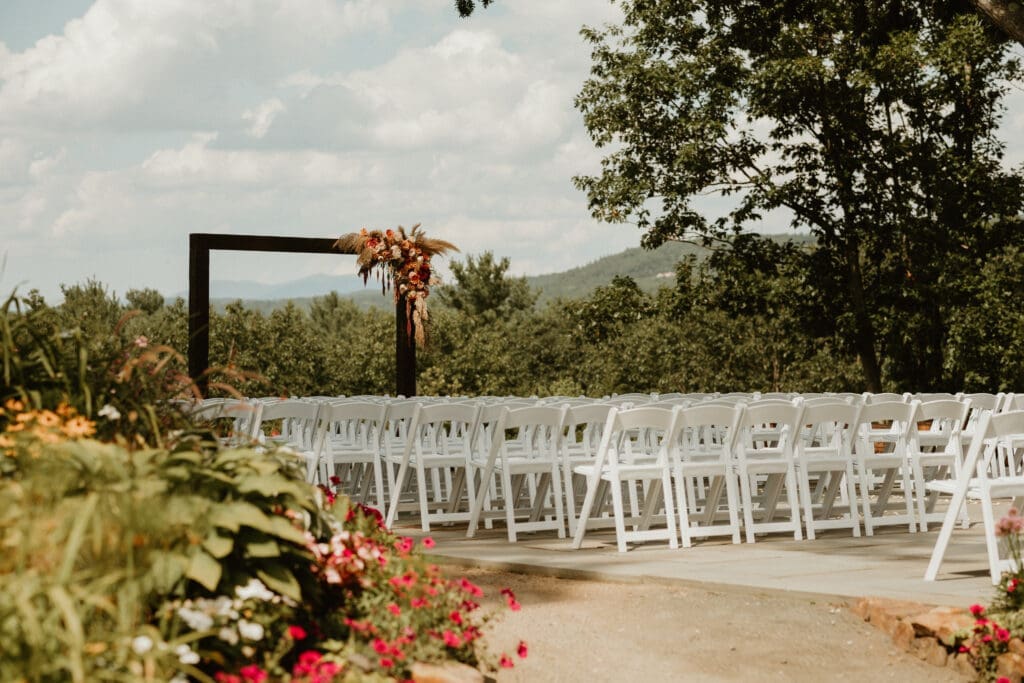 New Hampshire White Mountains wedding ceremony with stunning views captured by New England Wedding Photographer.
